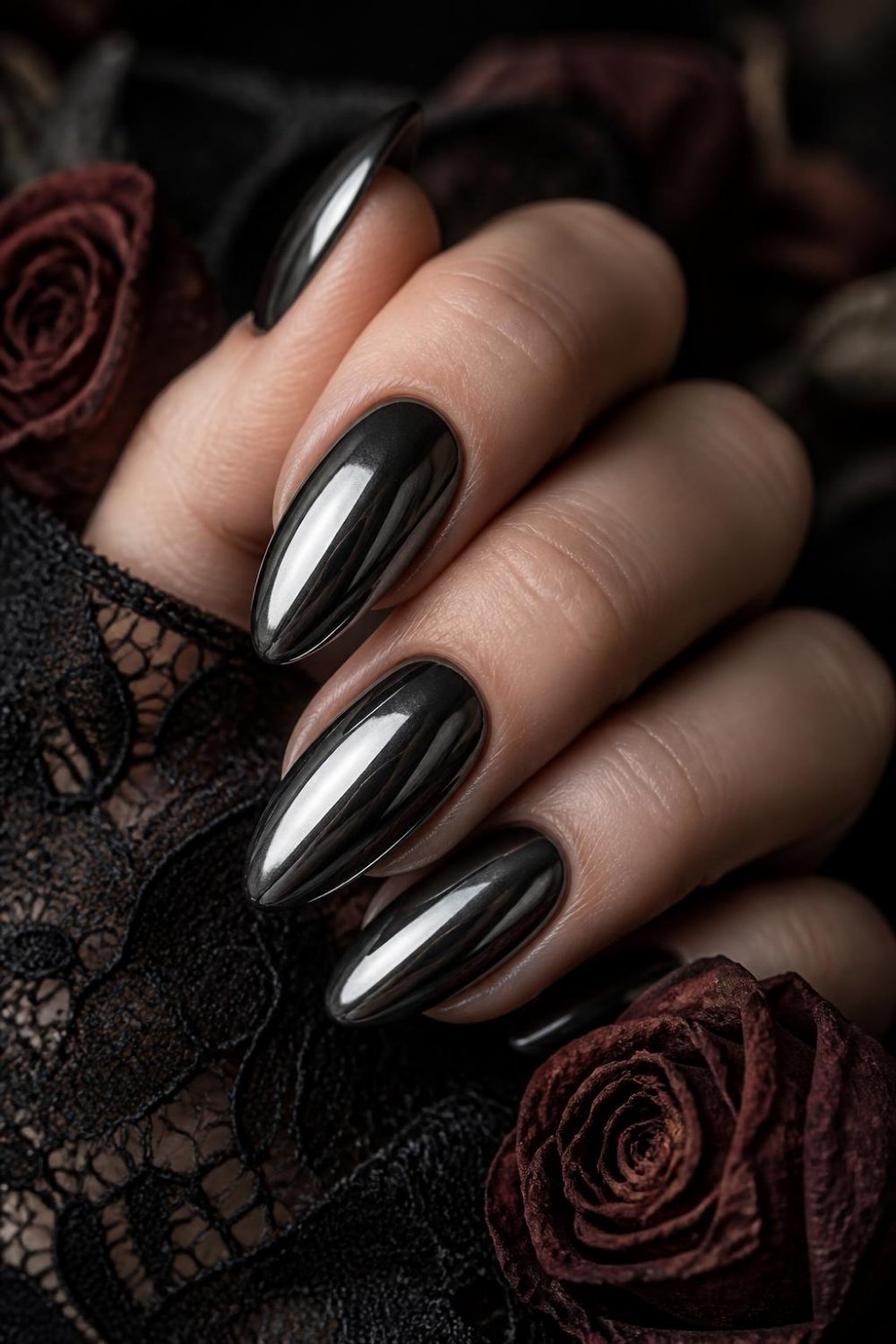 Black chrome gothic nails with a metallic gunmetal mirror finish
