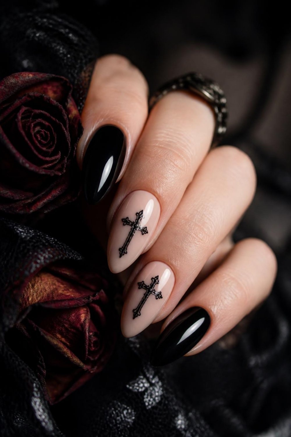 Black cross gothic nails with small gothic crosses on nude accent nails