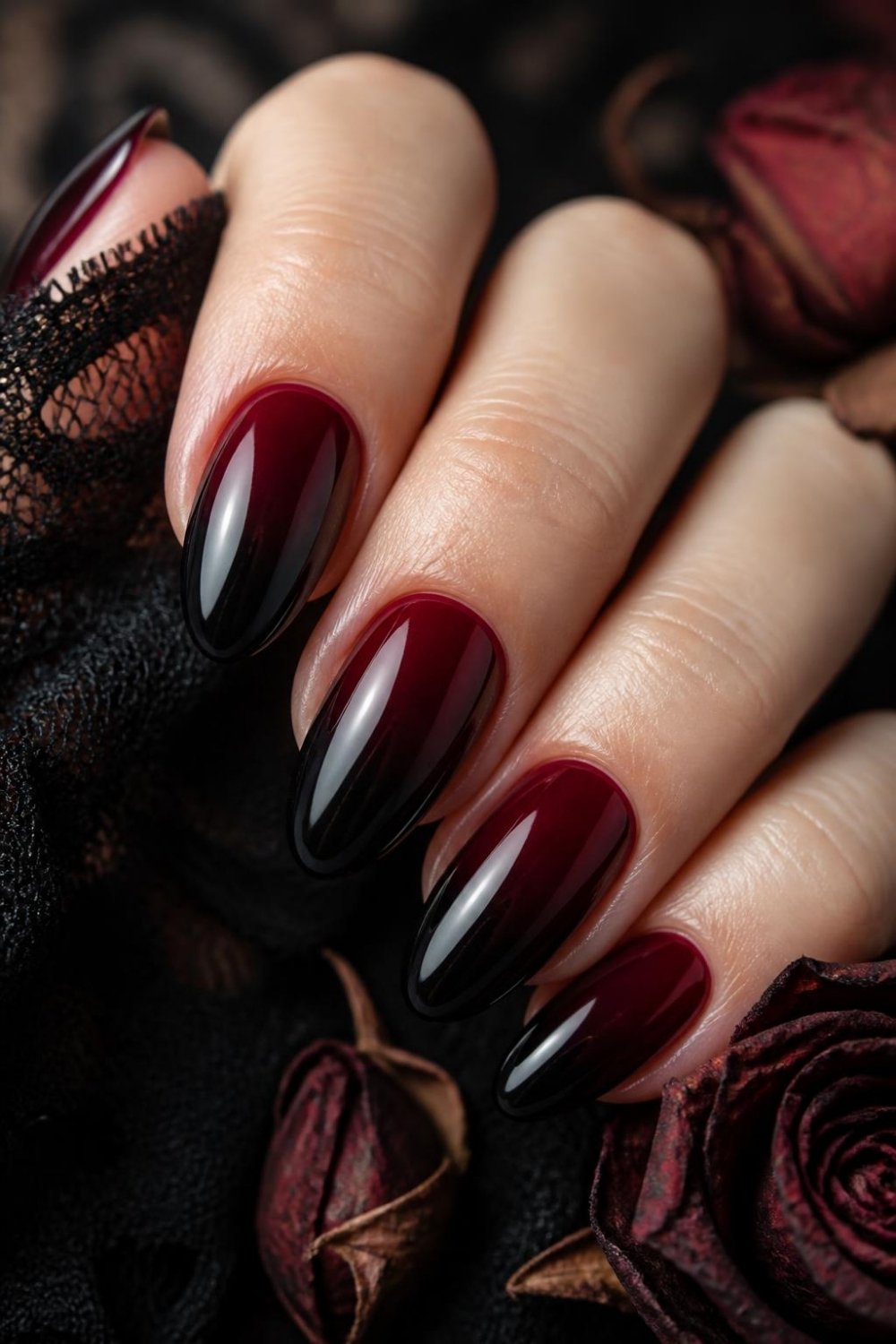 Black and red ombre gothic nails fading from blood red to black
