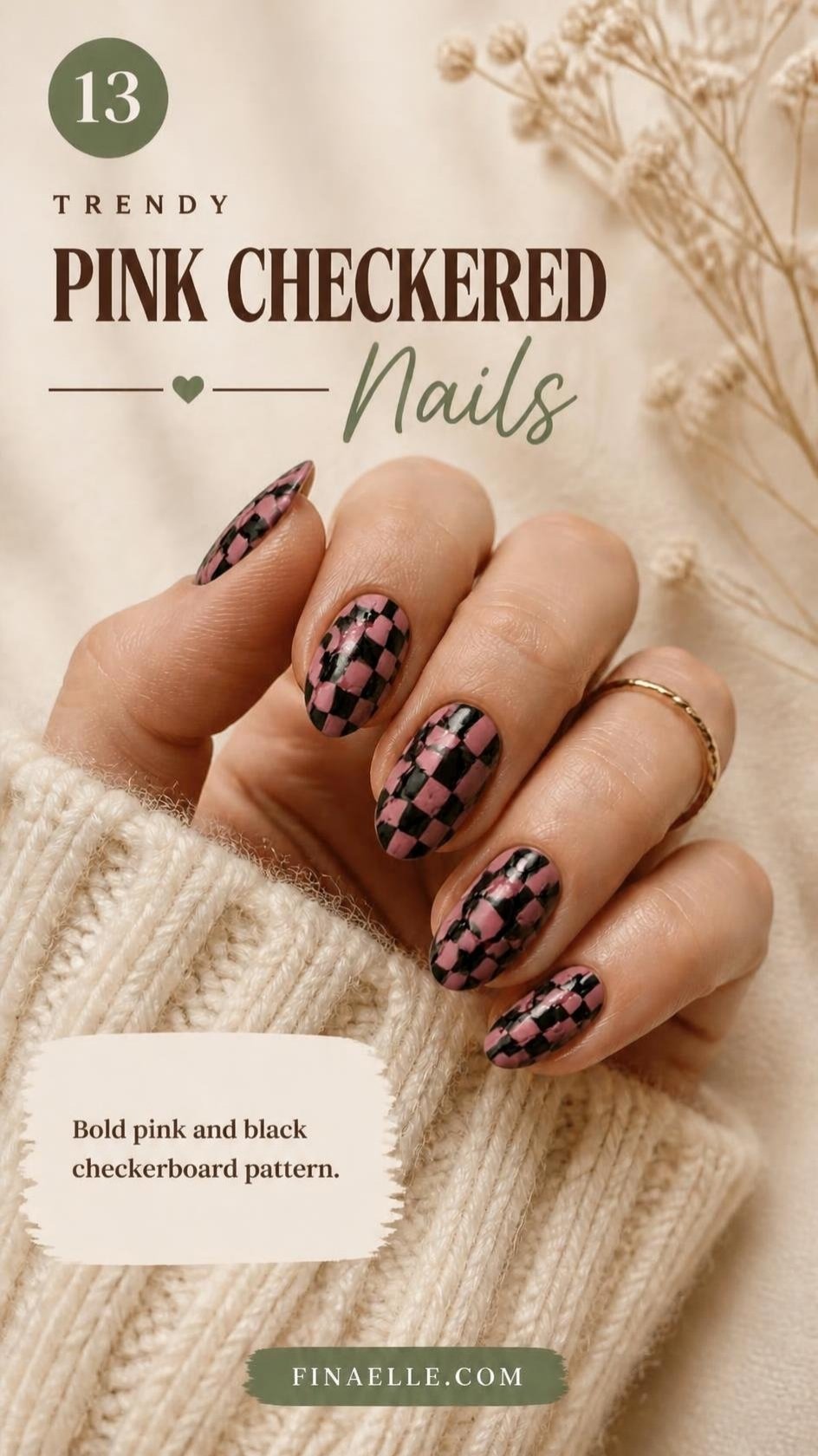 Pink and black checkered Halloween nails on almond nails