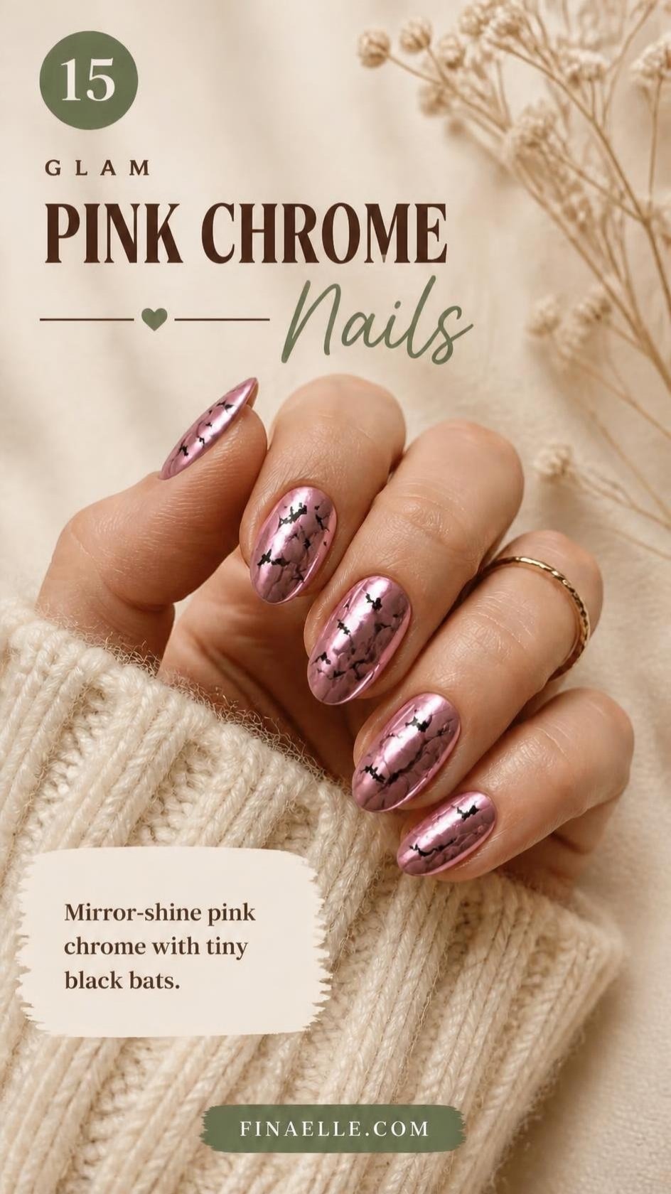 Pink chrome Halloween nails with black bat decals on almond nails