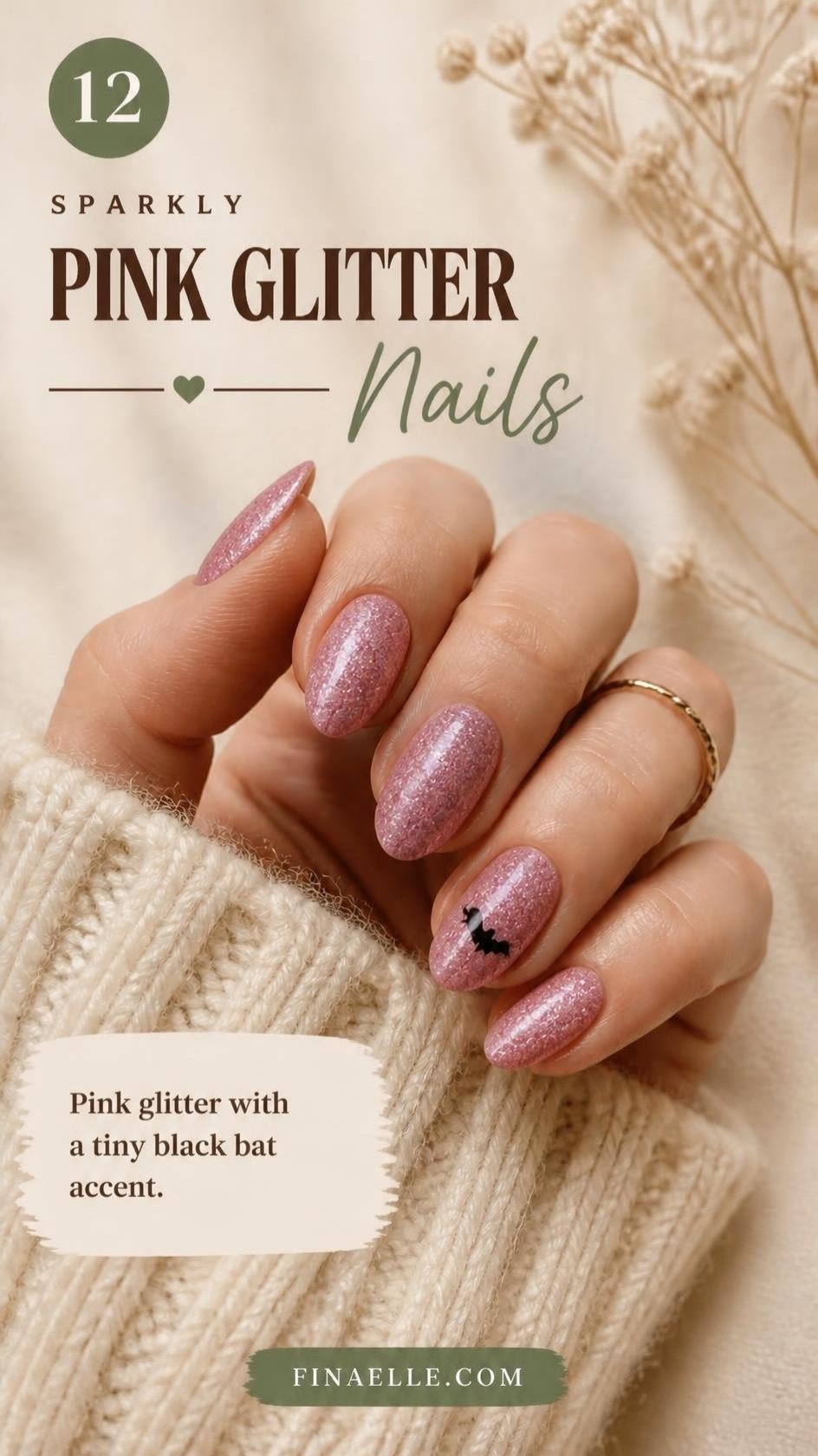 Pink glitter Halloween nails with a black bat accent on almond nails