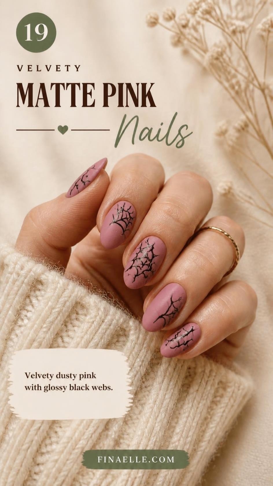 Matte pink Halloween nails with glossy black spiderwebs on almond nails