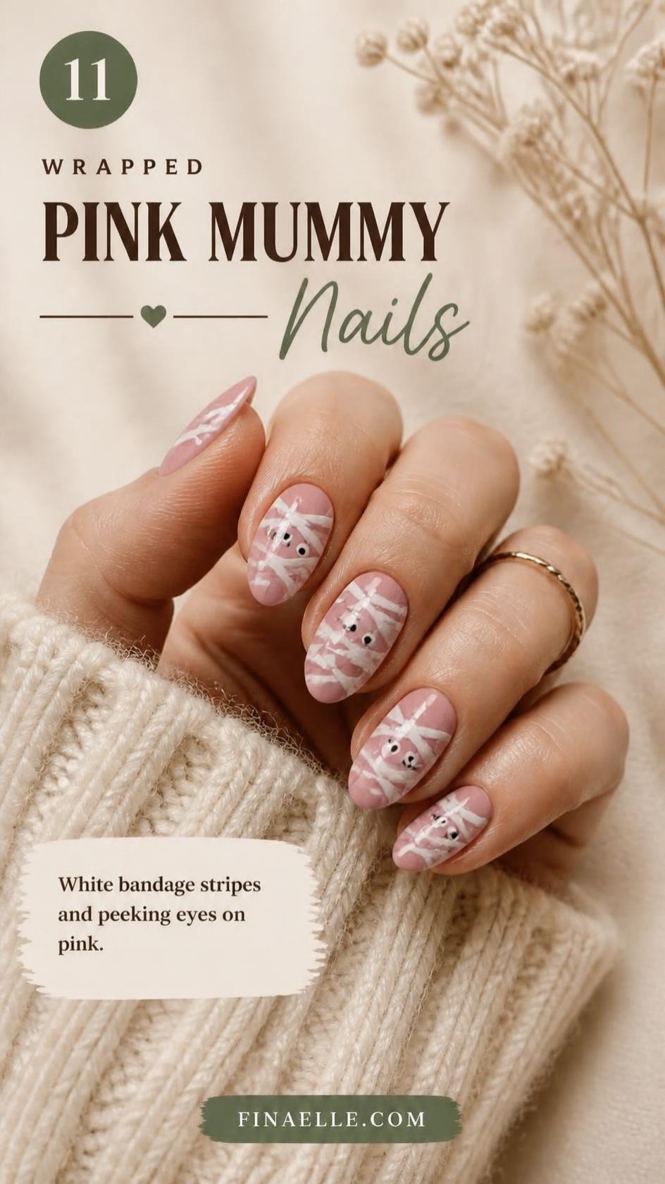 Pink mummy Halloween nails with white bandage stripes on light pink almond nails
