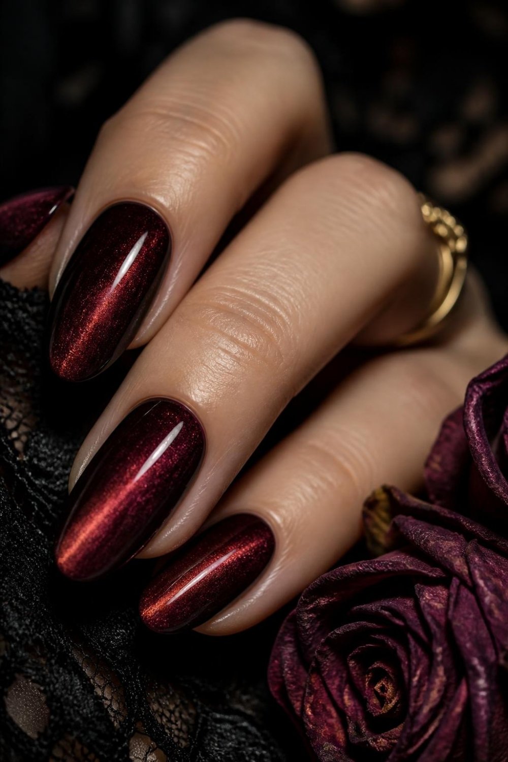 Velvet burgundy gothic nails with a deep shimmering velvet finish